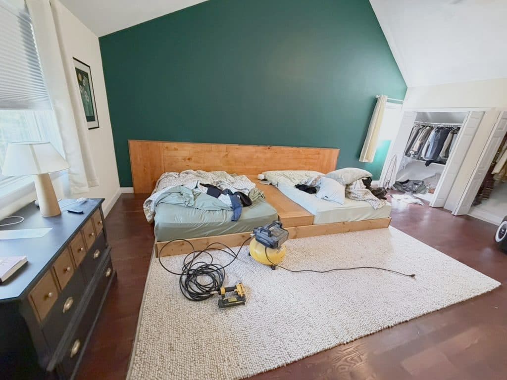Platform bed installed, green wall