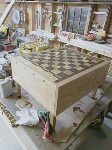 Oak game table, checkerboard + border inlay