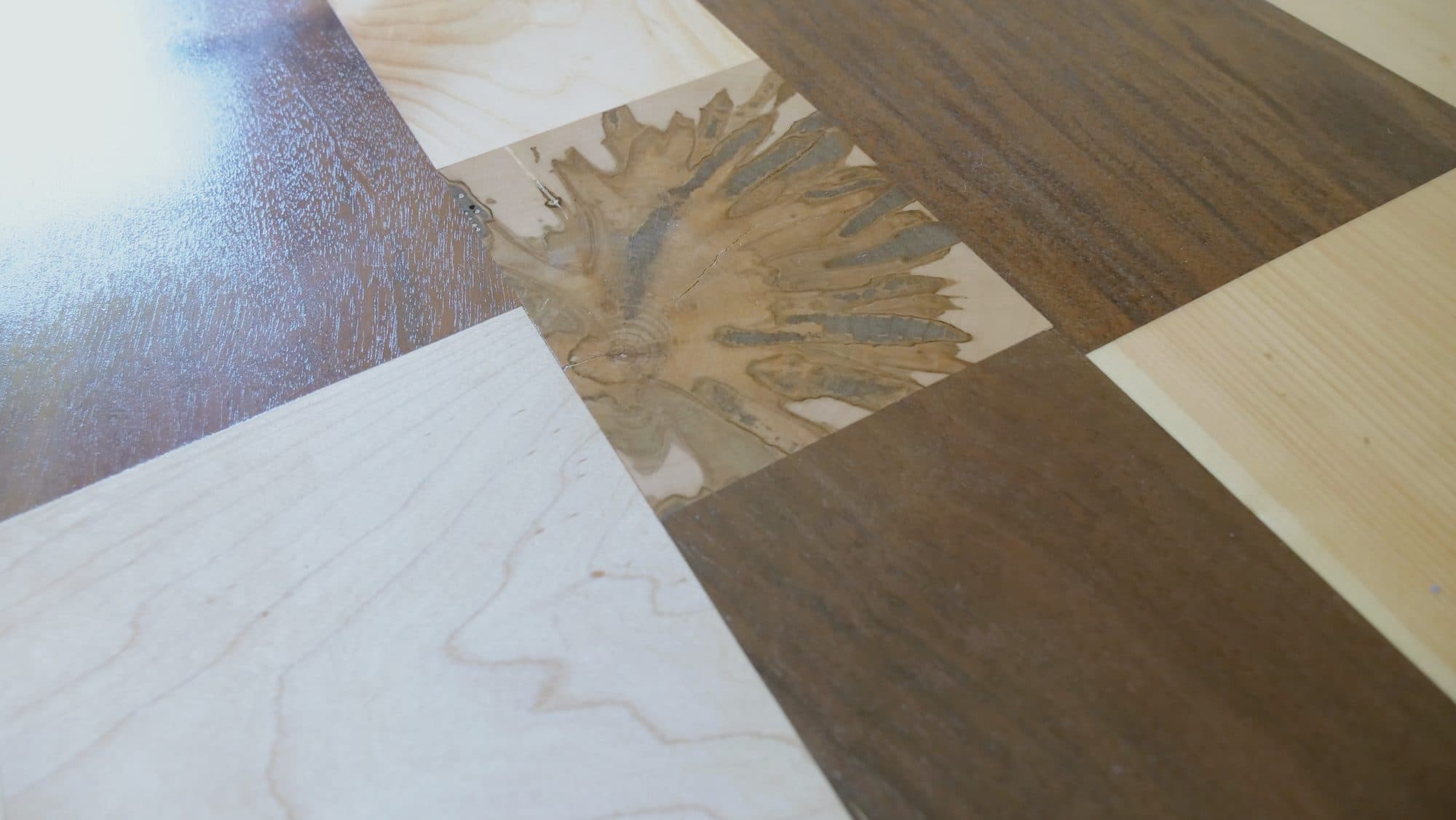 Fold-up wall-mounted desk, patchwork hardwood top