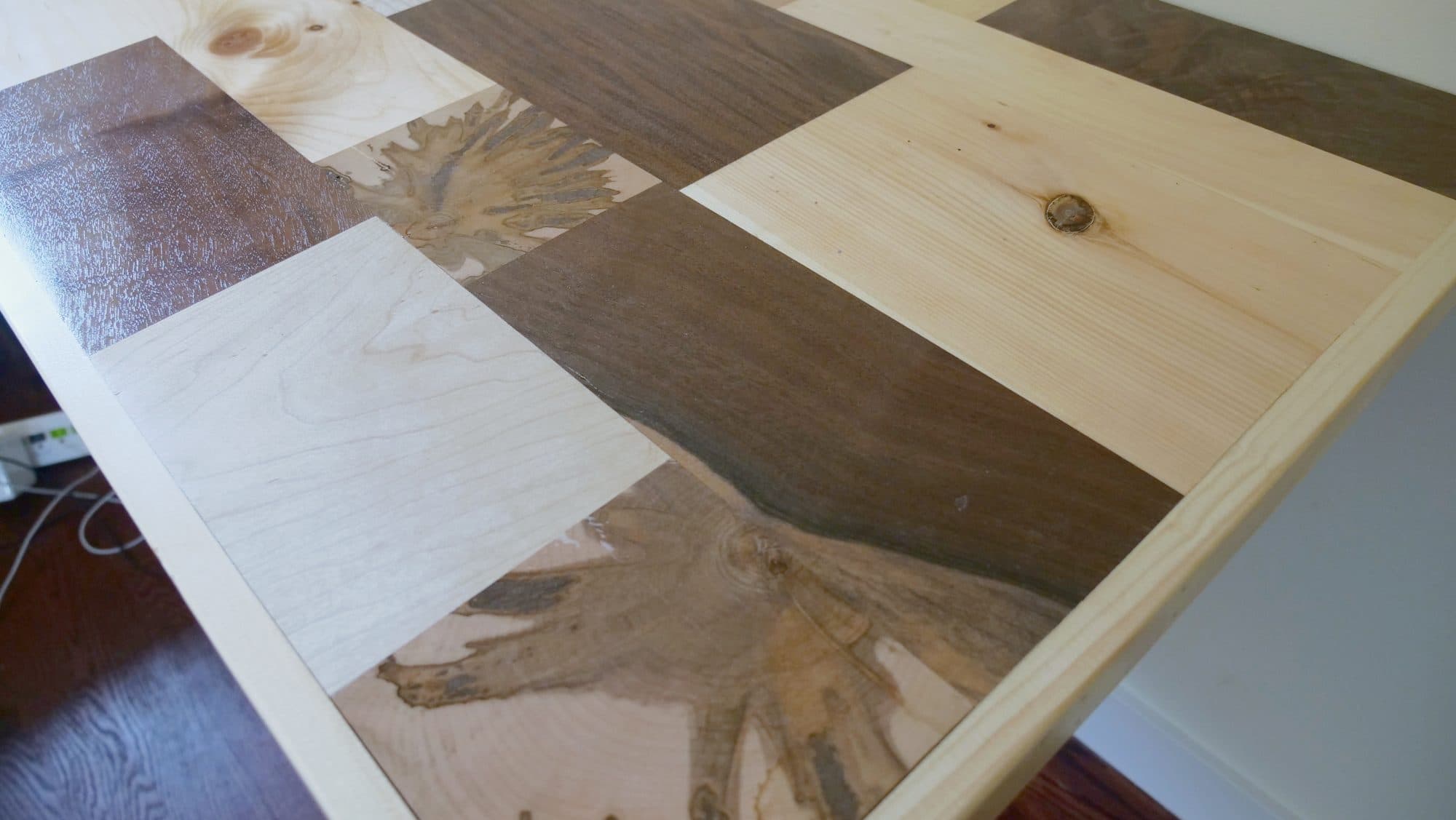 Fold-up wall-mounted desk, patchwork hardwood top