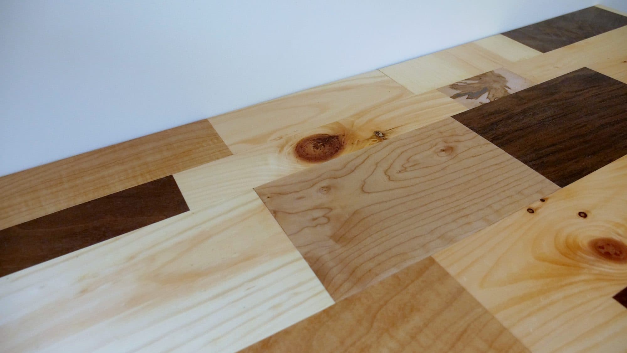 Fold-up wall-mounted desk, patchwork hardwood top