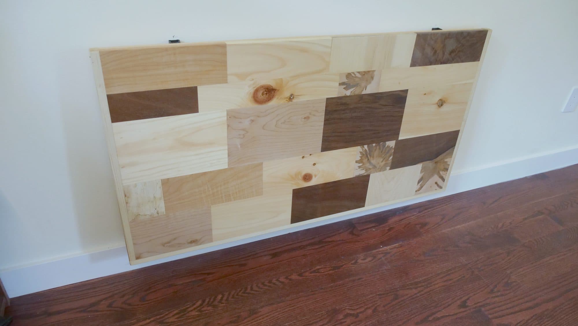 Fold-up wall-mounted desk, patchwork hardwood top