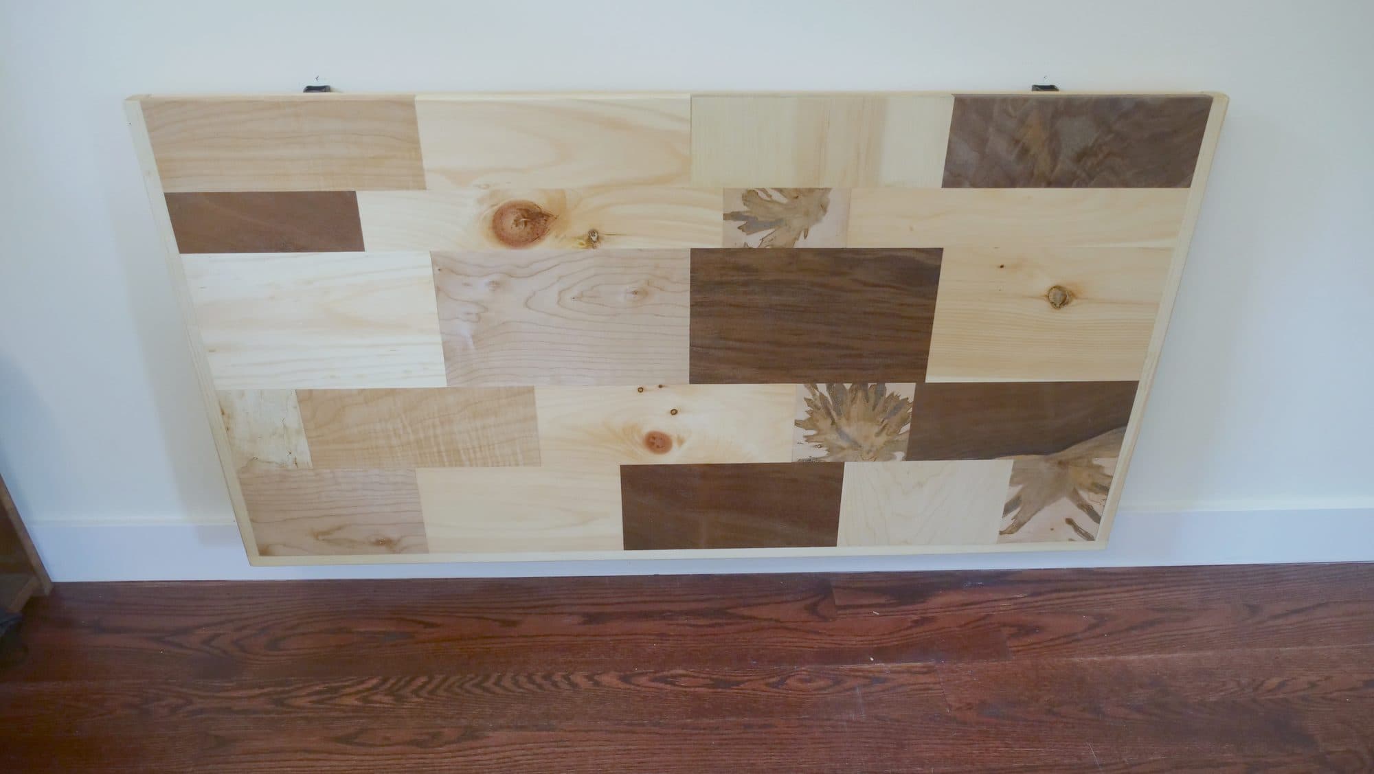 Fold-up wall-mounted desk, patchwork hardwood top