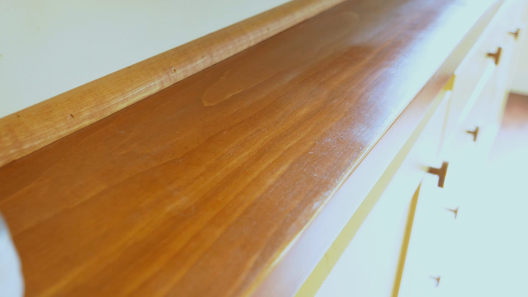 Stained console top finish detail