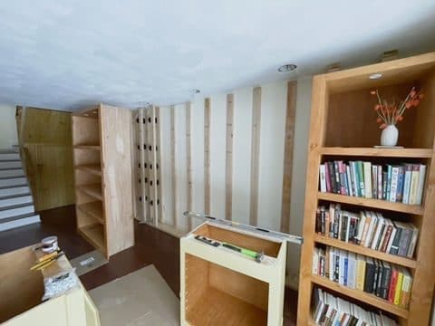Built-in bookcases around room, install