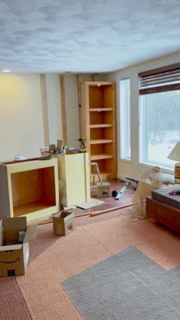 Built-in corner bookcase by window, install