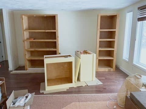 Built-in bookcases + primed base cabinets