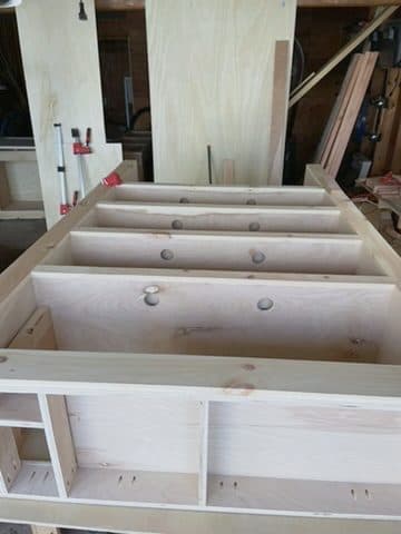 Entertainment-center carcass, dowel-plug dividers