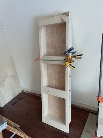 Tall bookcase carcass glue-up indoors