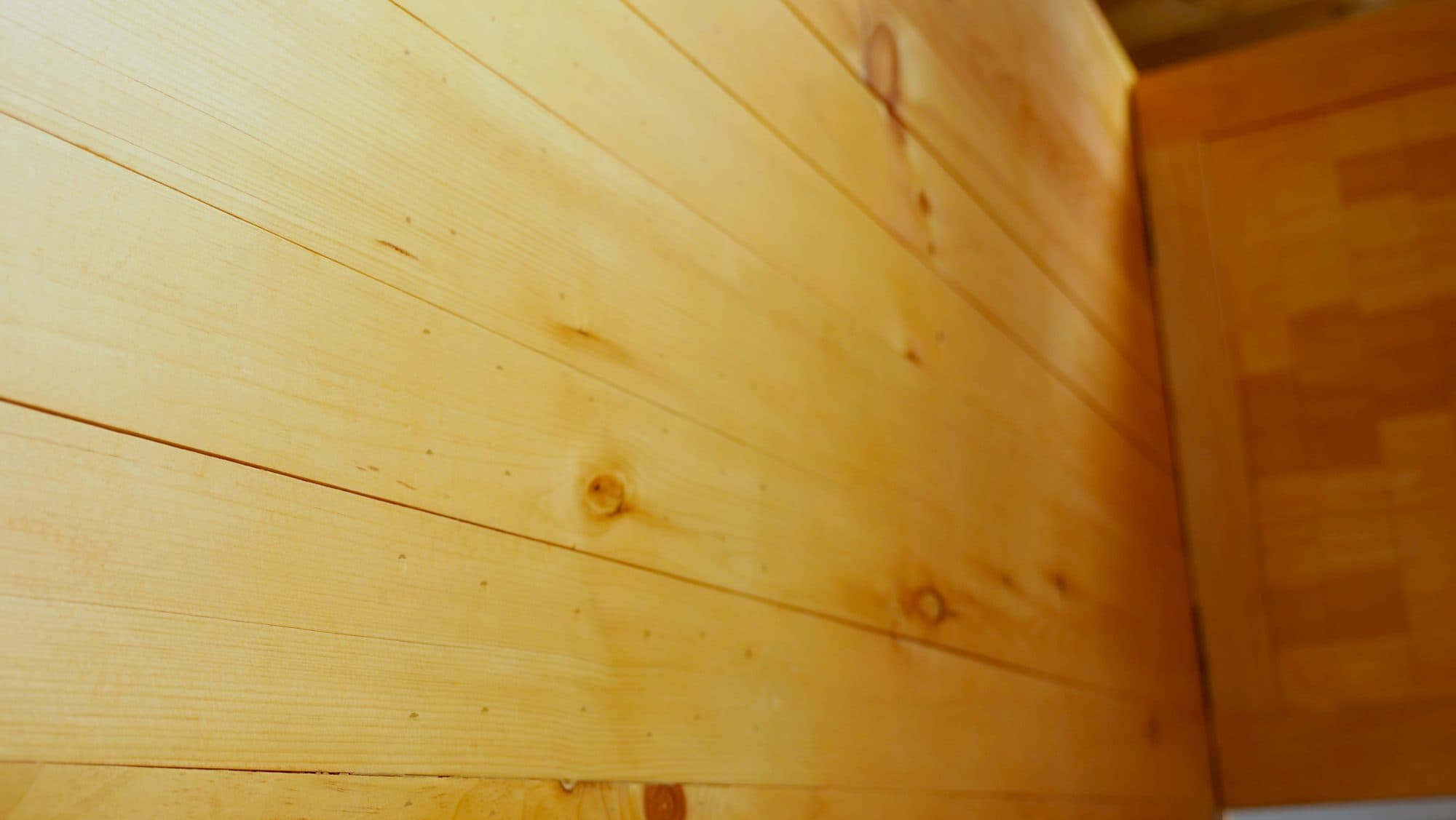 Pine T&G stair-side cladding detail