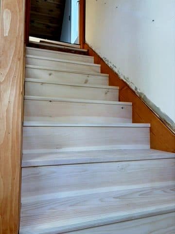 Bare treads/risers pre-stain, looking up