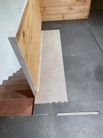 Lower landing, stained treads, underlayment