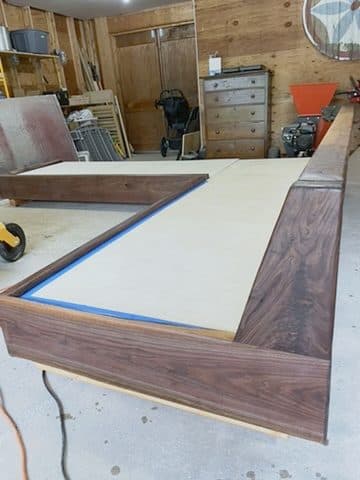 Daybed corner, walnut rails + ply deck